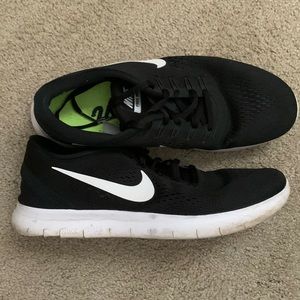 Black Nike free runs. Size 10